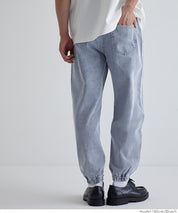 Men's washed jeans with tapered cuffs