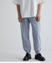 Men's washed jeans with tapered cuffs