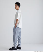 Men's washed jeans with tapered cuffs