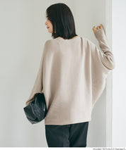 Dolman sleeve and boat neck knit