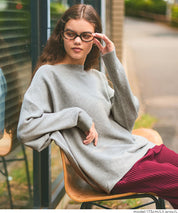 Dolman sleeve and boat neck knit