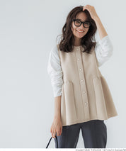 Firm pearl button peplum vest