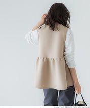 Firm pearl button peplum vest