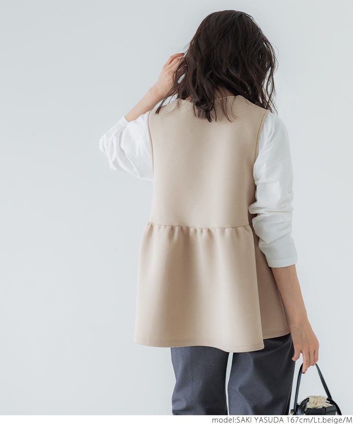 Firm pearl button peplum vest