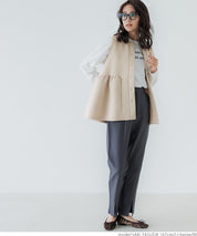 Firm pearl button peplum vest