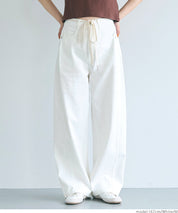 Lace-up washed wide-leg jeans