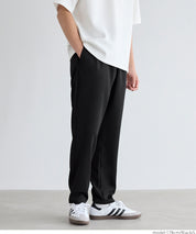 Men's embossed elastic casual pants