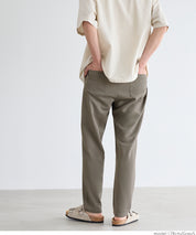 Men's embossed elastic casual pants