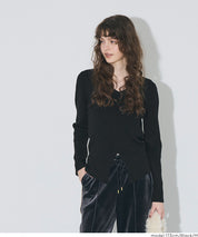 Slit V-neck long-sleeved knitted top