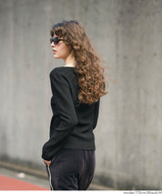 Slit V-neck long-sleeved knitted top