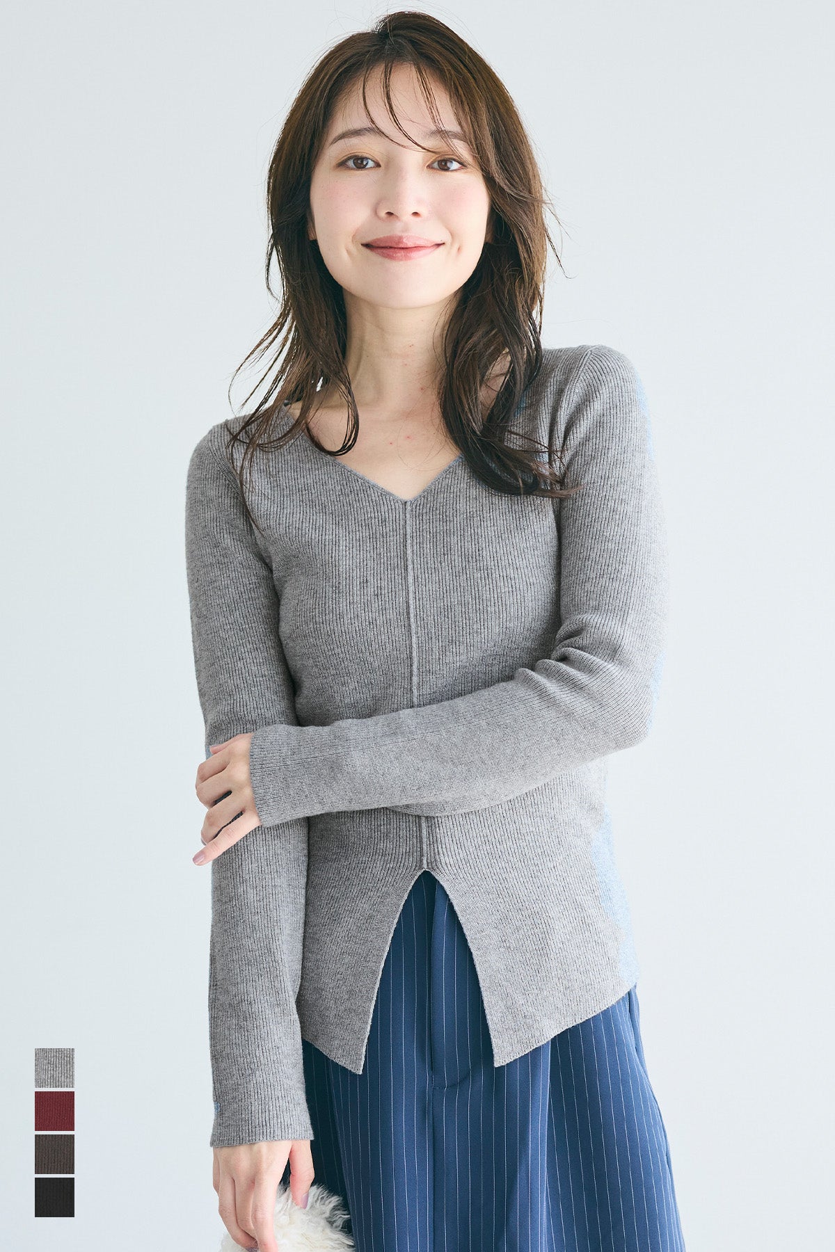 Slit V-neck long-sleeved knitted top