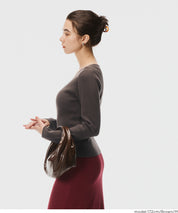 Slit V-neck long-sleeved knitted top