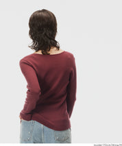 Slit V-neck long-sleeved knitted top