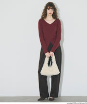 Slit V-neck long-sleeved knitted top