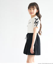 Children's pleated skirt with tie waist design