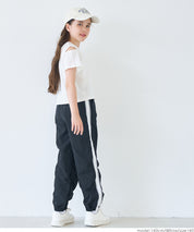 Children's off-the-shoulder short-sleeved top with cross-back design