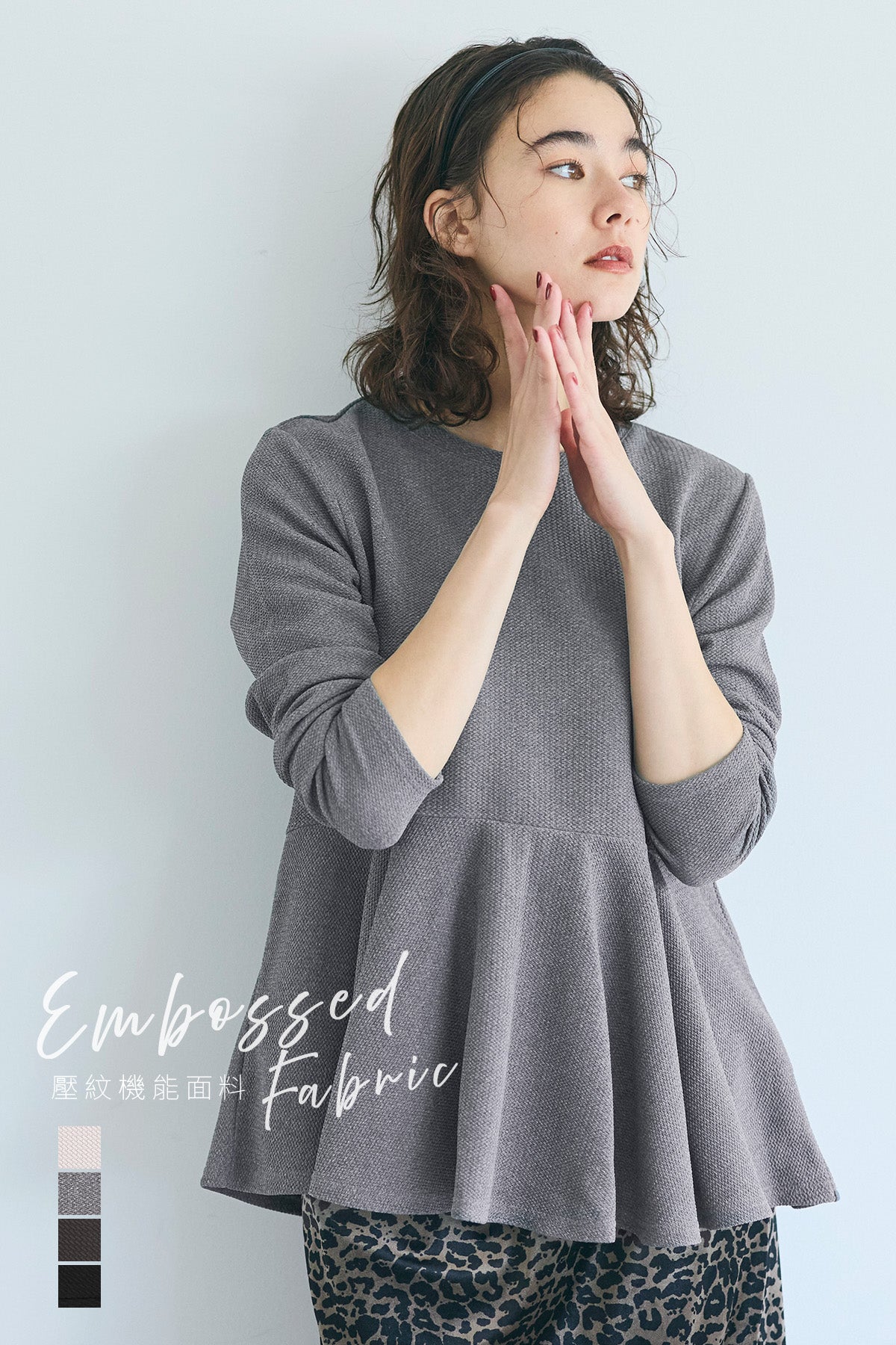 Embossed flared hem long sleeve top