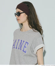 Cotton short-sleeved top with English logo and fold-over cuffs