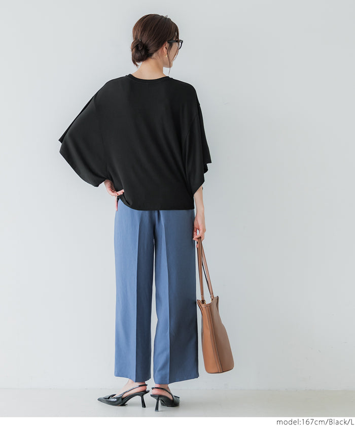 Loose-fitting top with draped sleeves