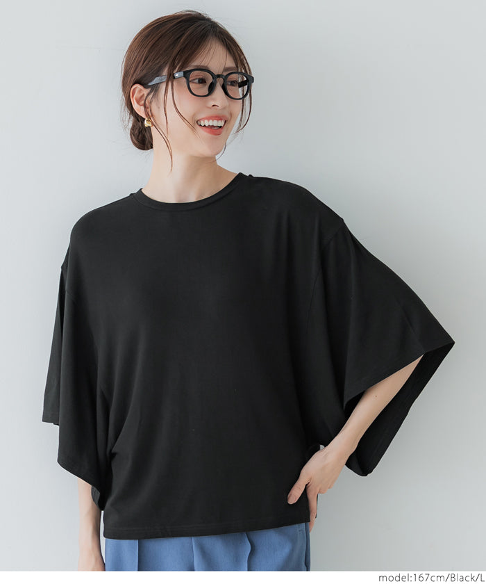 Loose-fitting top with draped sleeves
