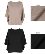 Loose-fitting top with draped sleeves