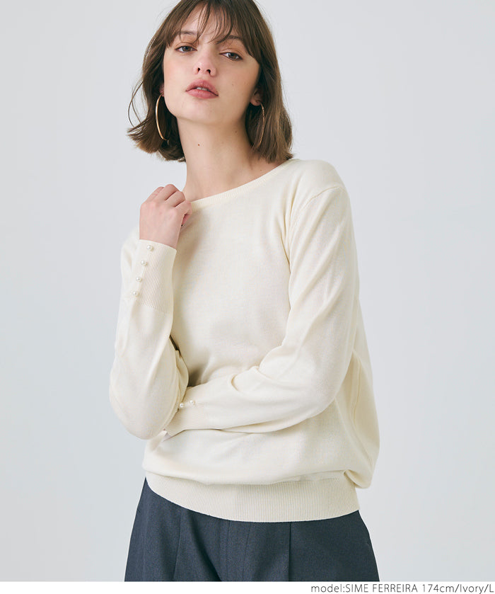 Pearl cuff crew neck knit top