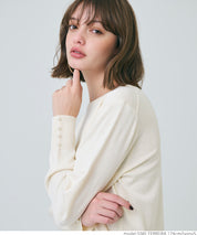 Pearl cuff crew neck knit top