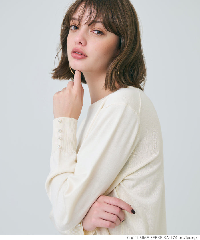Pearl cuff crew neck knit top