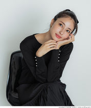 Pearl cuff crew neck knit top