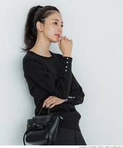 Pearl cuff crew neck knit top