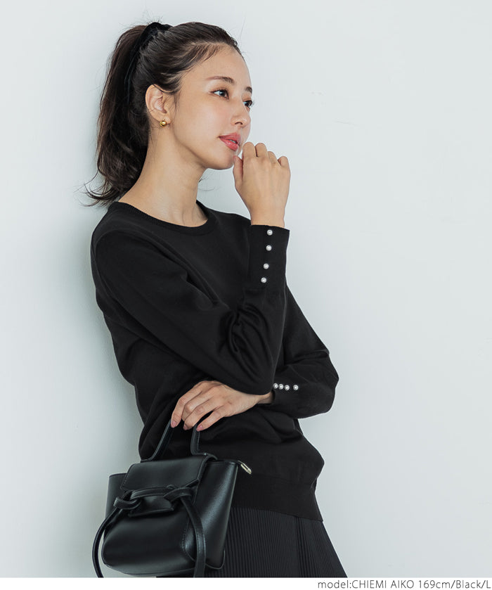 Pearl cuff crew neck knit top