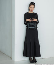 Pearl cuff crew neck knit top