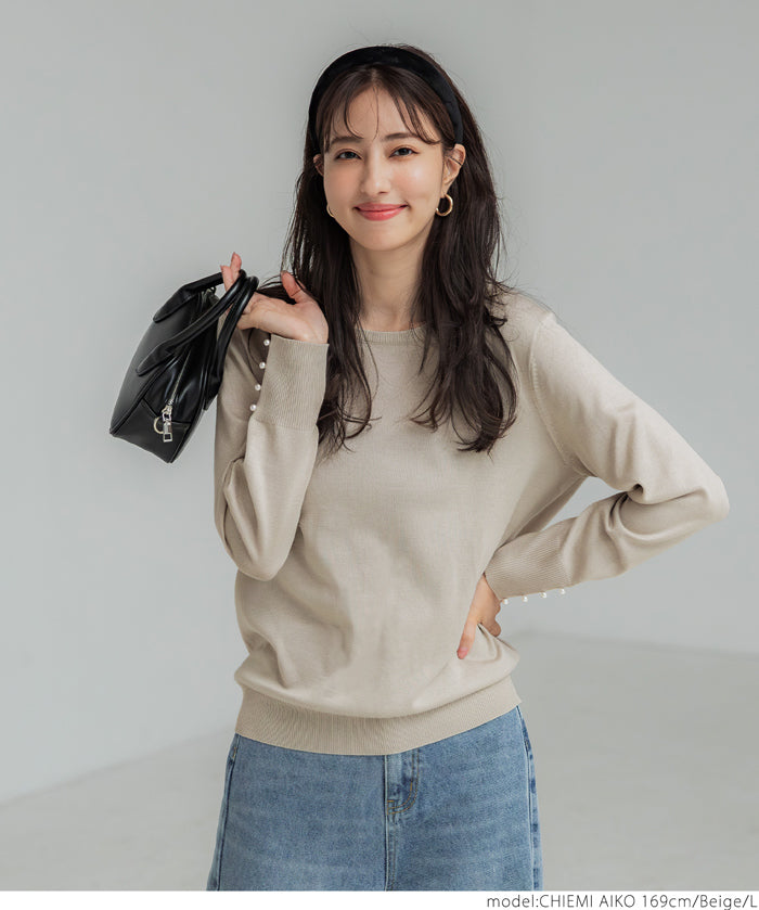 Pearl cuff crew neck knit top