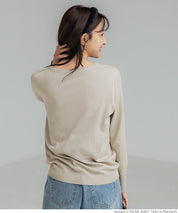 Pearl cuff crew neck knit top