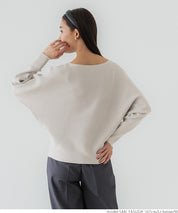Dolman sleeve and boat neck knit