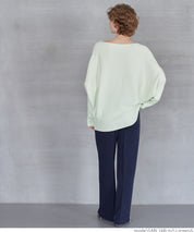 Dolman sleeve and boat neck knit
