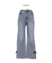 絲絨蝴蝶結裝飾牛仔褲