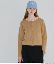 Lightweight knit cardigan with gold buttons for spring